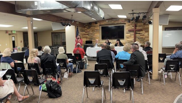 The room from the back as the meeting gets under way
