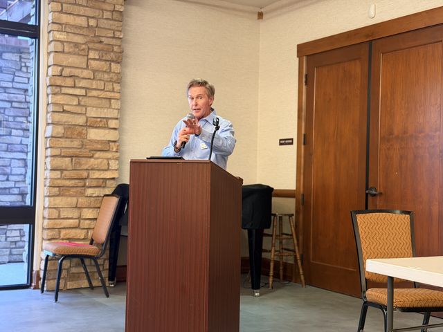 A speaker at the podium