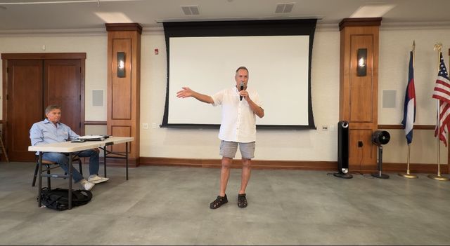 Paul making a point to the room